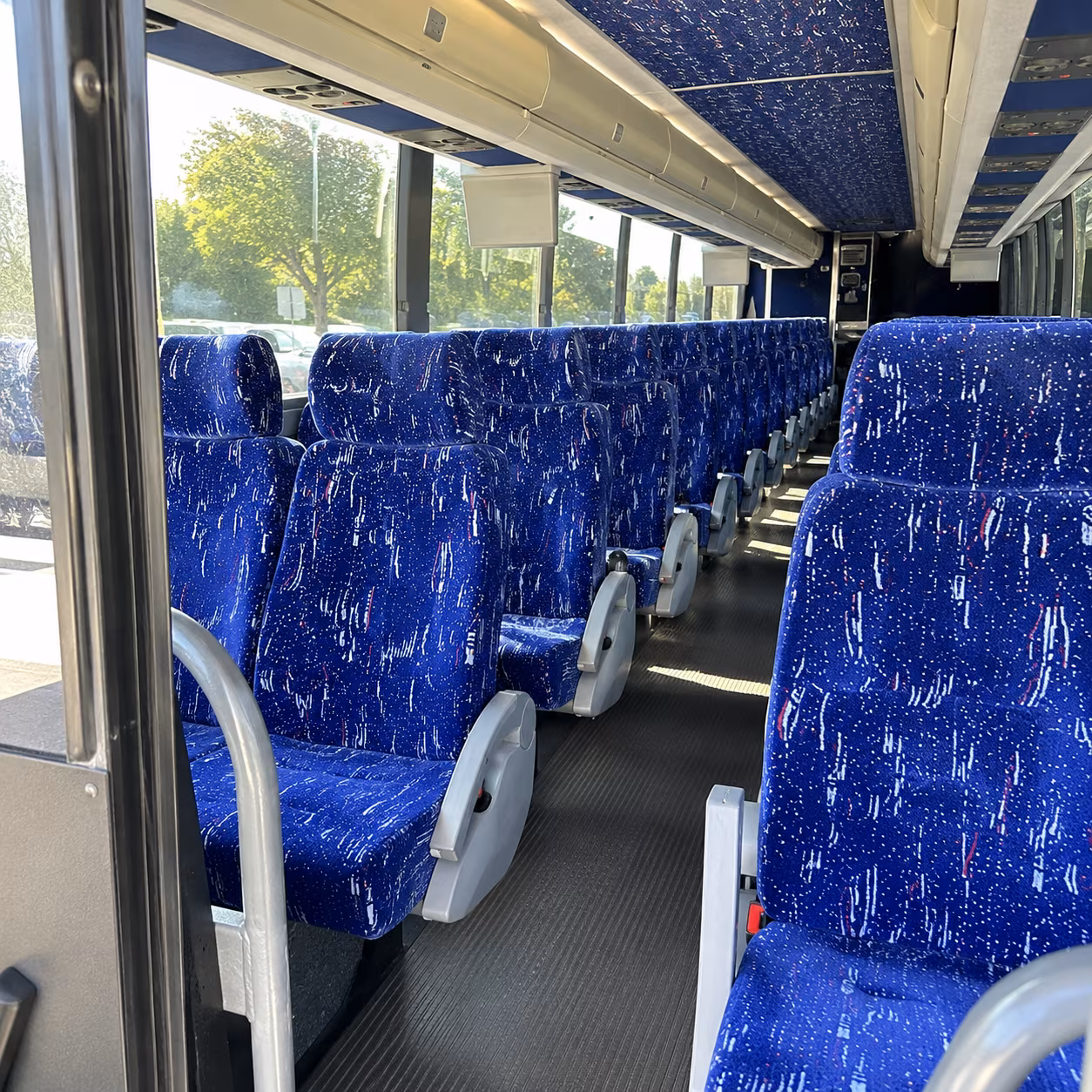 grand rapids 50 passenger charter bus inside