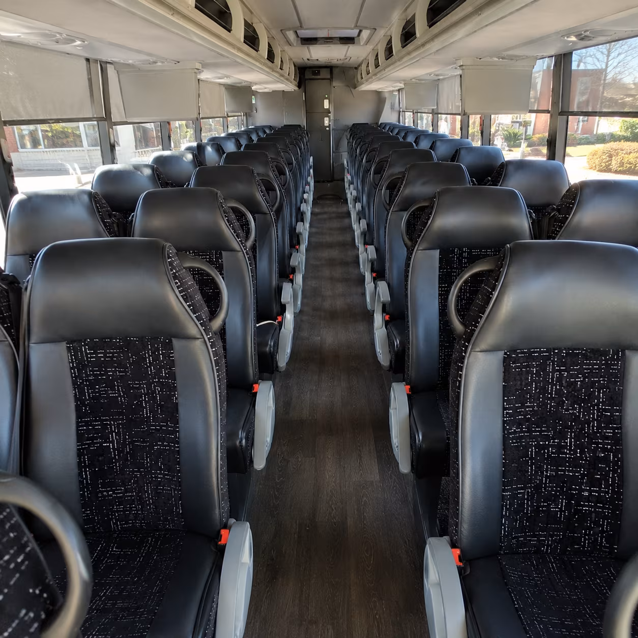 grand rapids 54 passenger charter bus inside