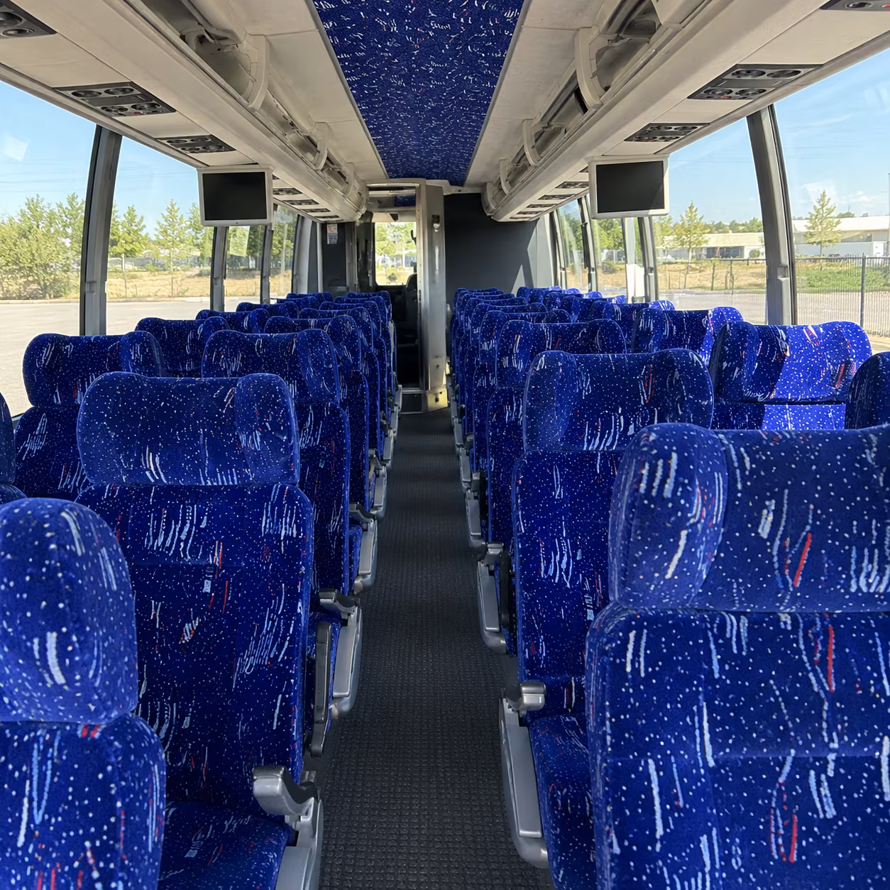 grand rapids 54 passenger charter bus interior